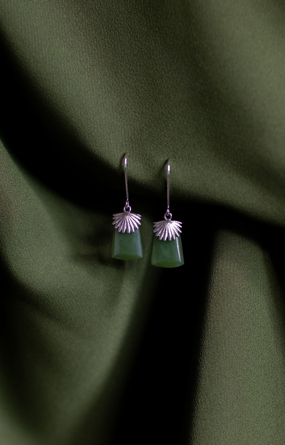 Feather Capped Toki Earrings