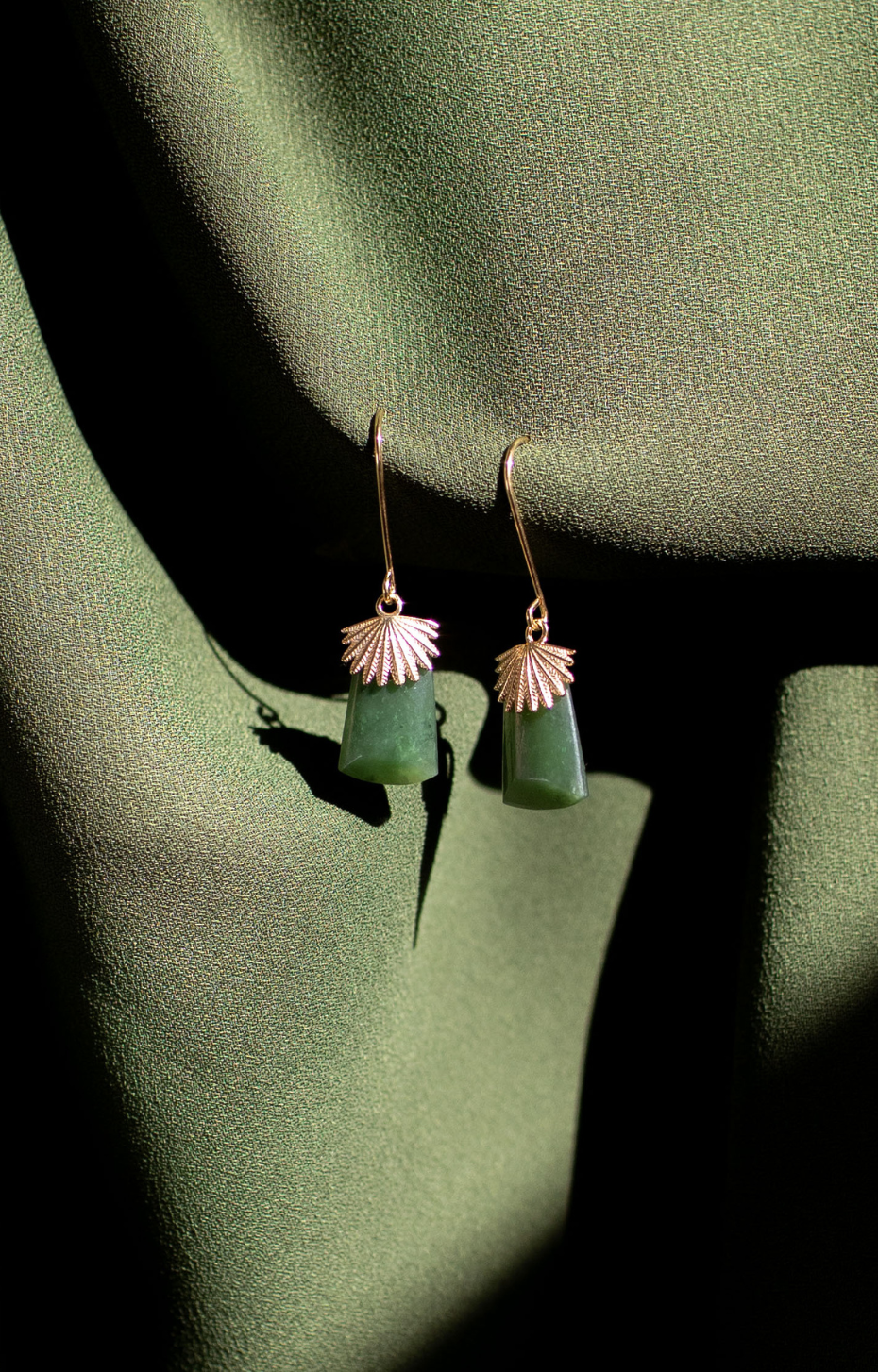 Feather Capped Toki Earrings