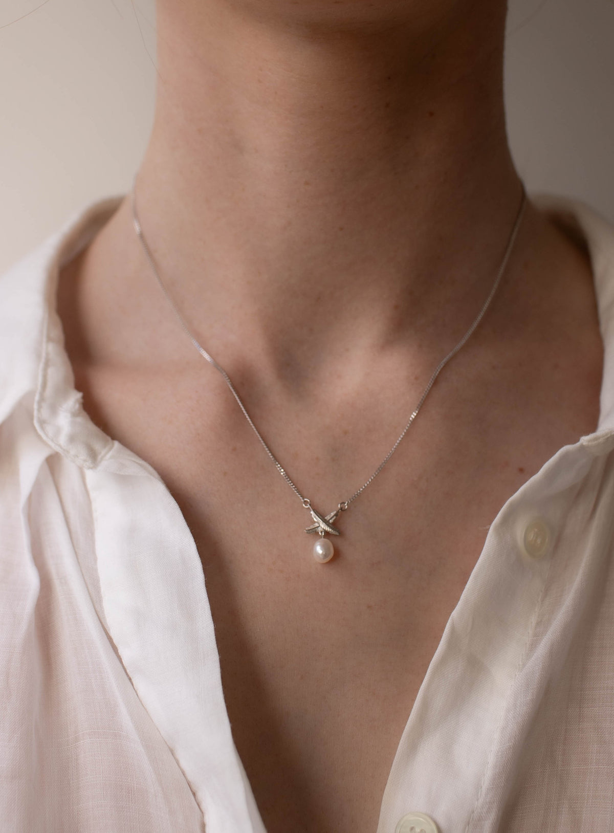 Feather Kisses Pearl Pendant